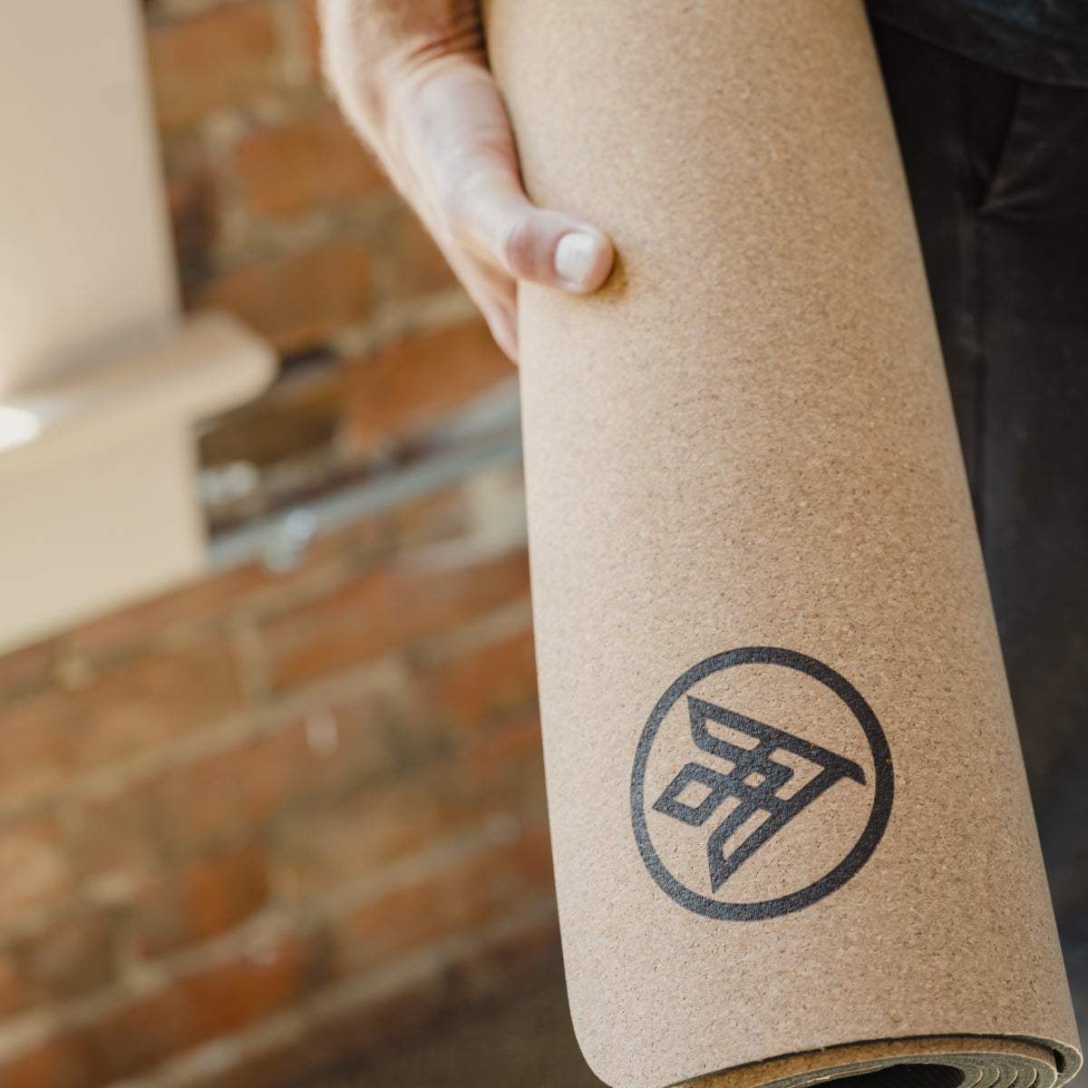 Holding the Flux Cork Yoga Mat