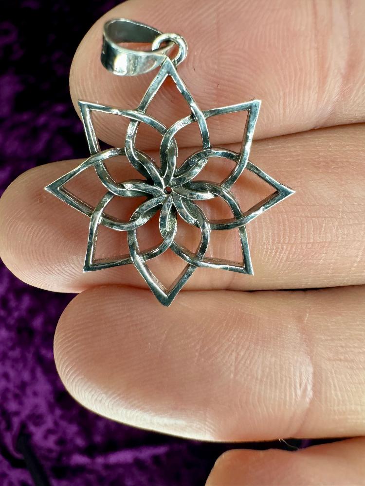 Opening Lotus Sterling Silver Pendant in hand closeup