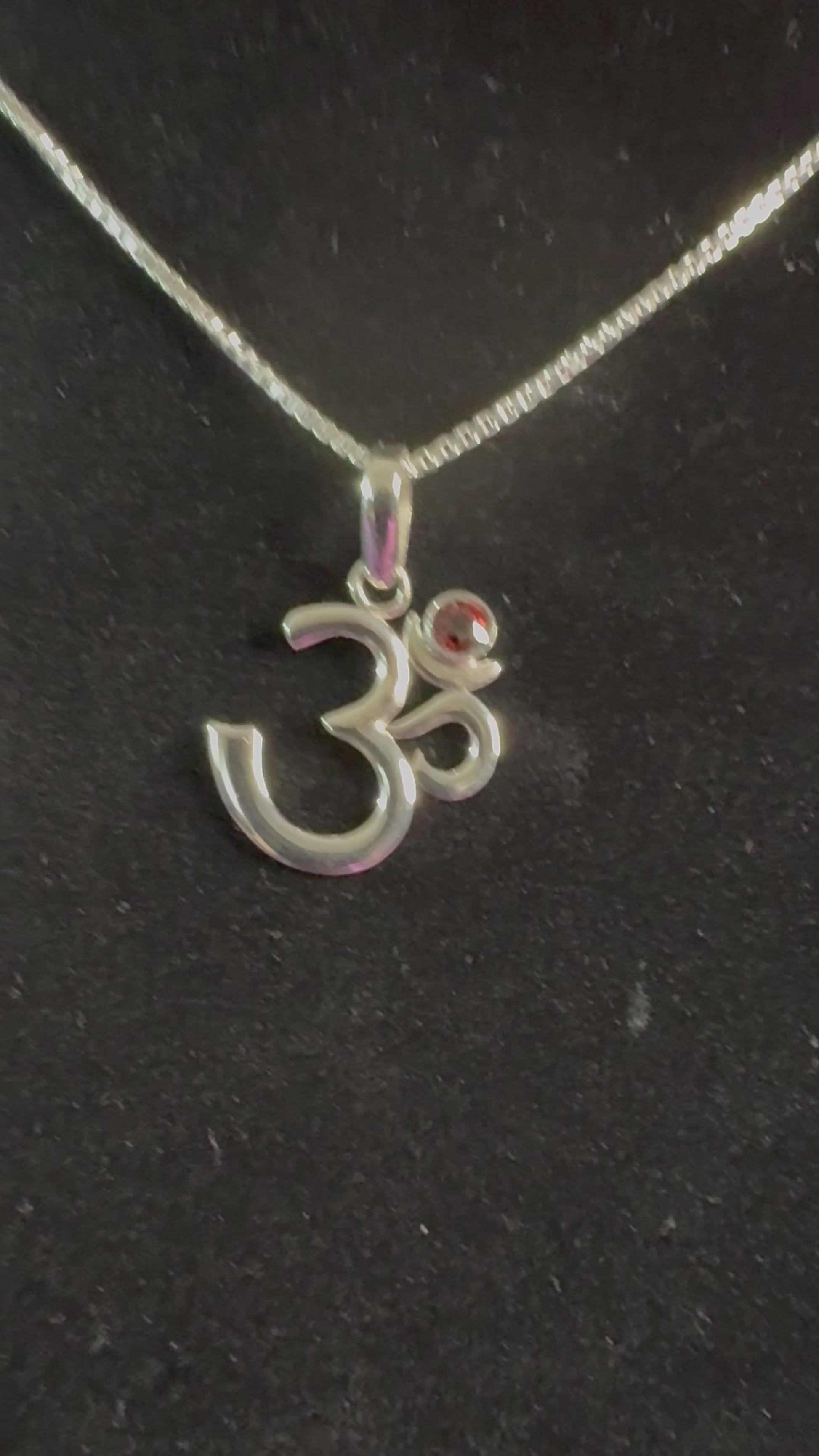 OM Symbol Sterling Silver Pendant with Garnet Light reflection