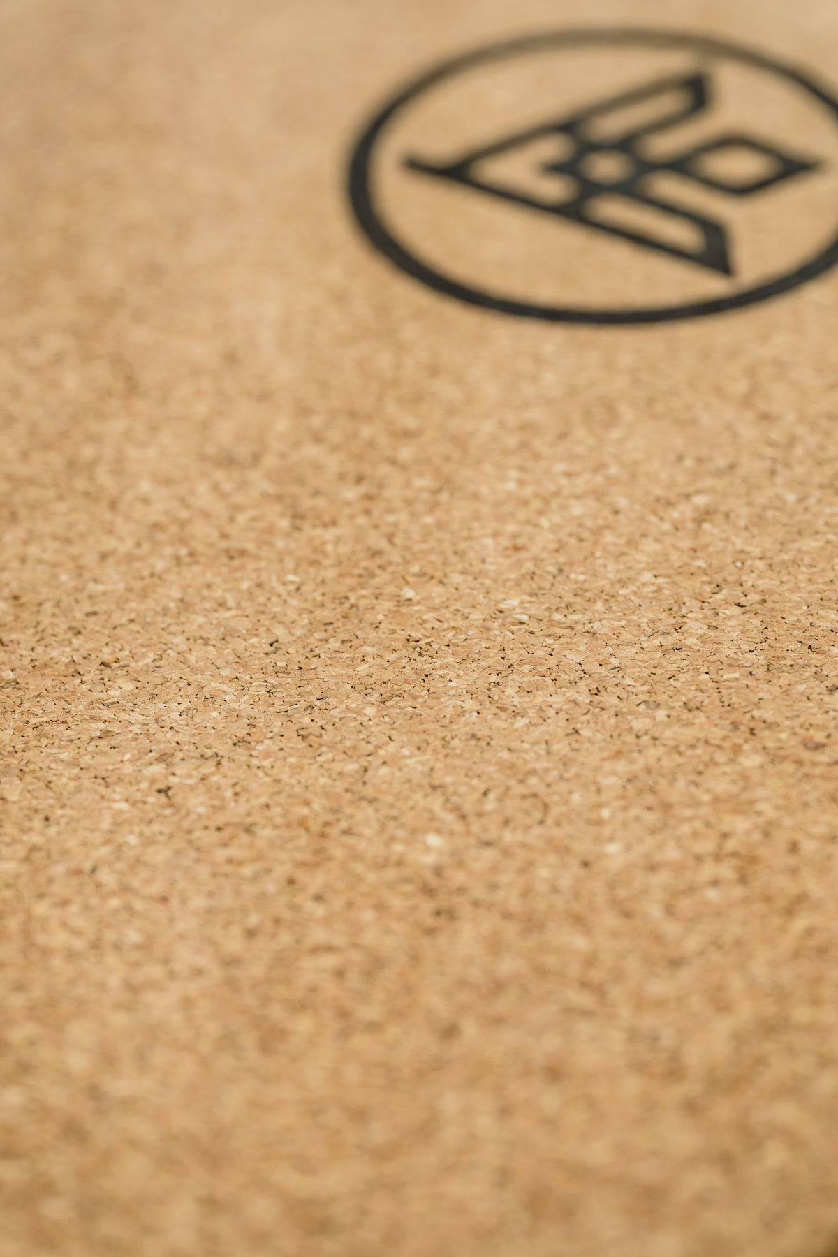 The Flux cork yoga mat cork surface texture closeup shot