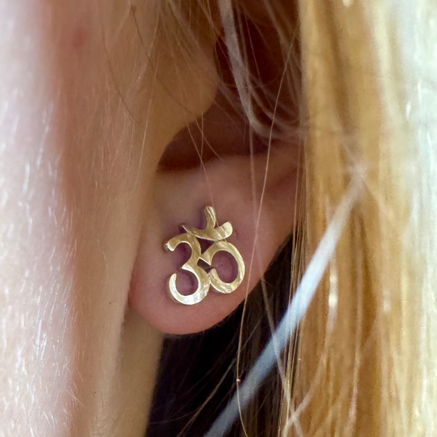 Om Symbol Stud Earrings in Sterling Silver Close Up Aesthetic