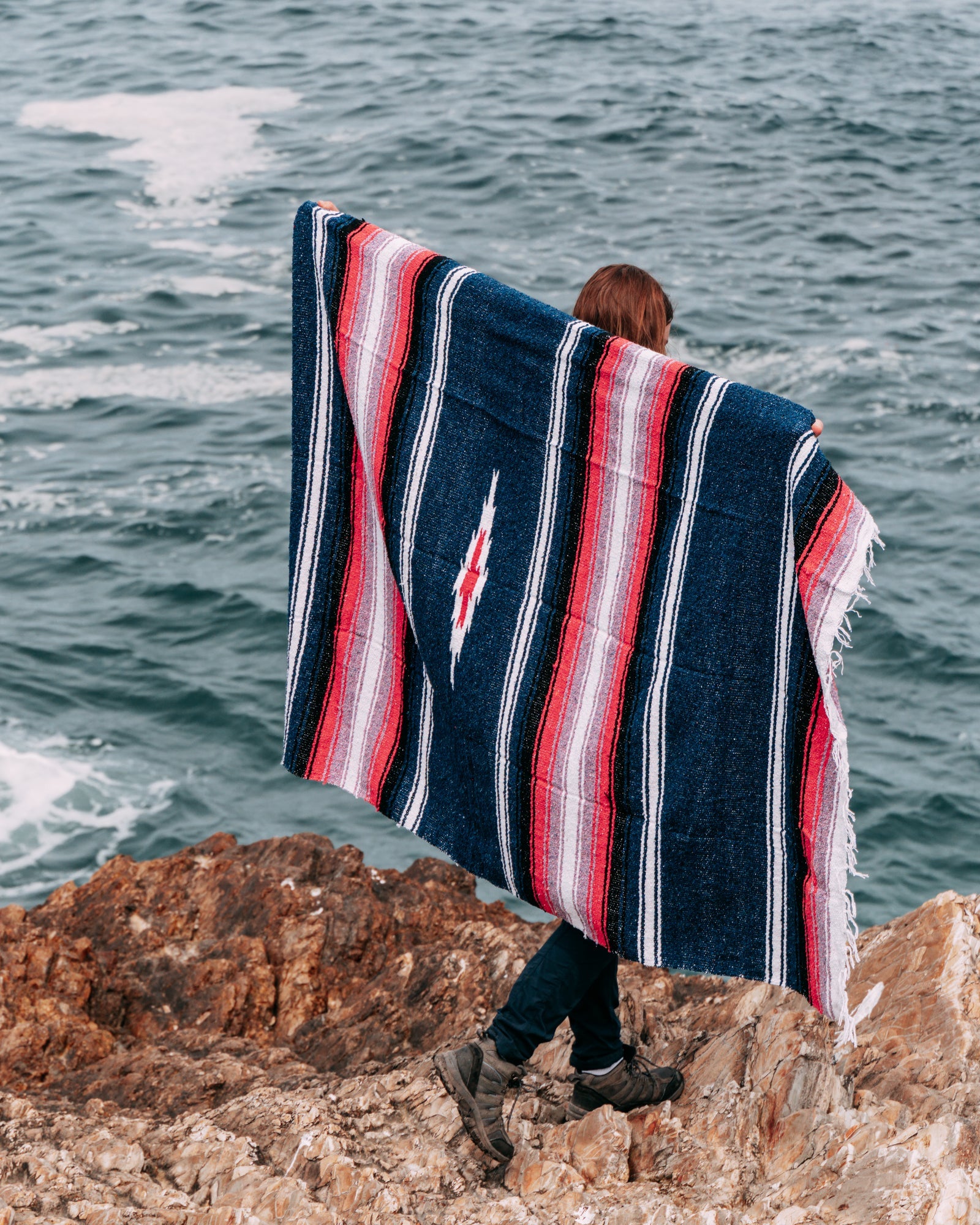 Aegean Blue & Pink Baja Diamond Yoga Blanket Held on Beach