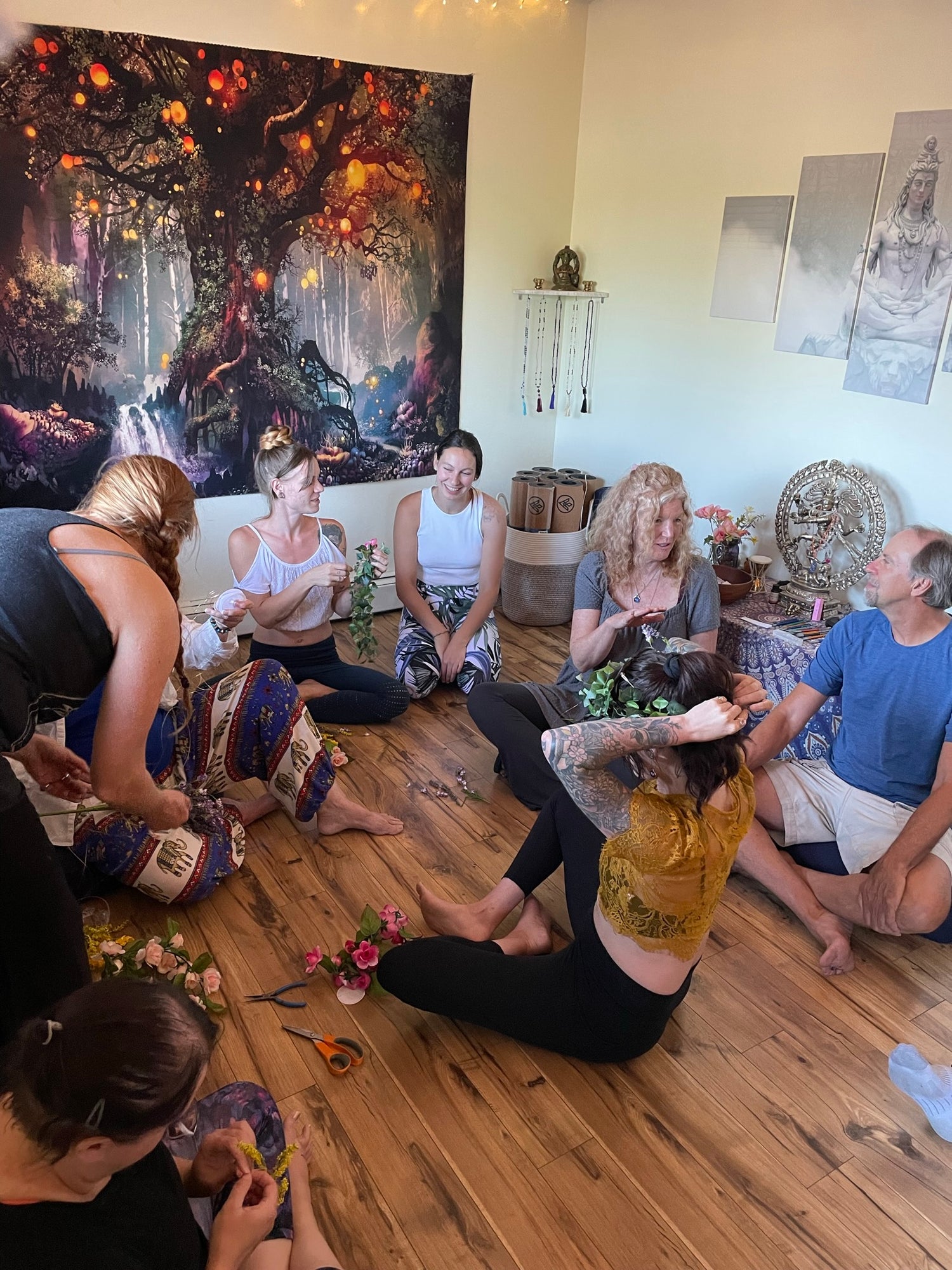 Bhakti House Yoga Studio during yoga workshop to craft flower crowns for summer solstice celebration