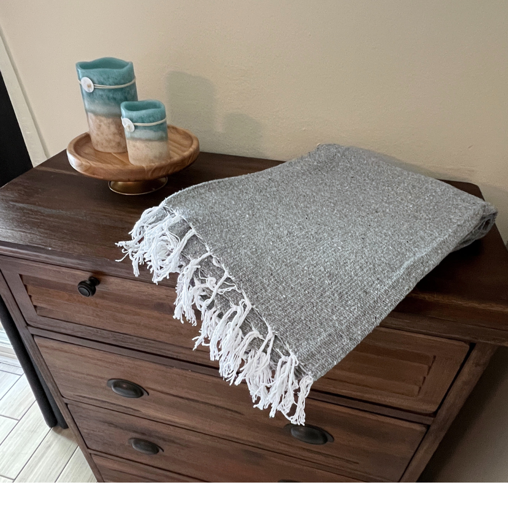 Grey Solid Baja Yoga Blanket Laid Out Outdoors