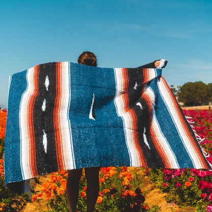 Harvest Moon Blue Baja Yoga Blanket Held Open Lifestyle