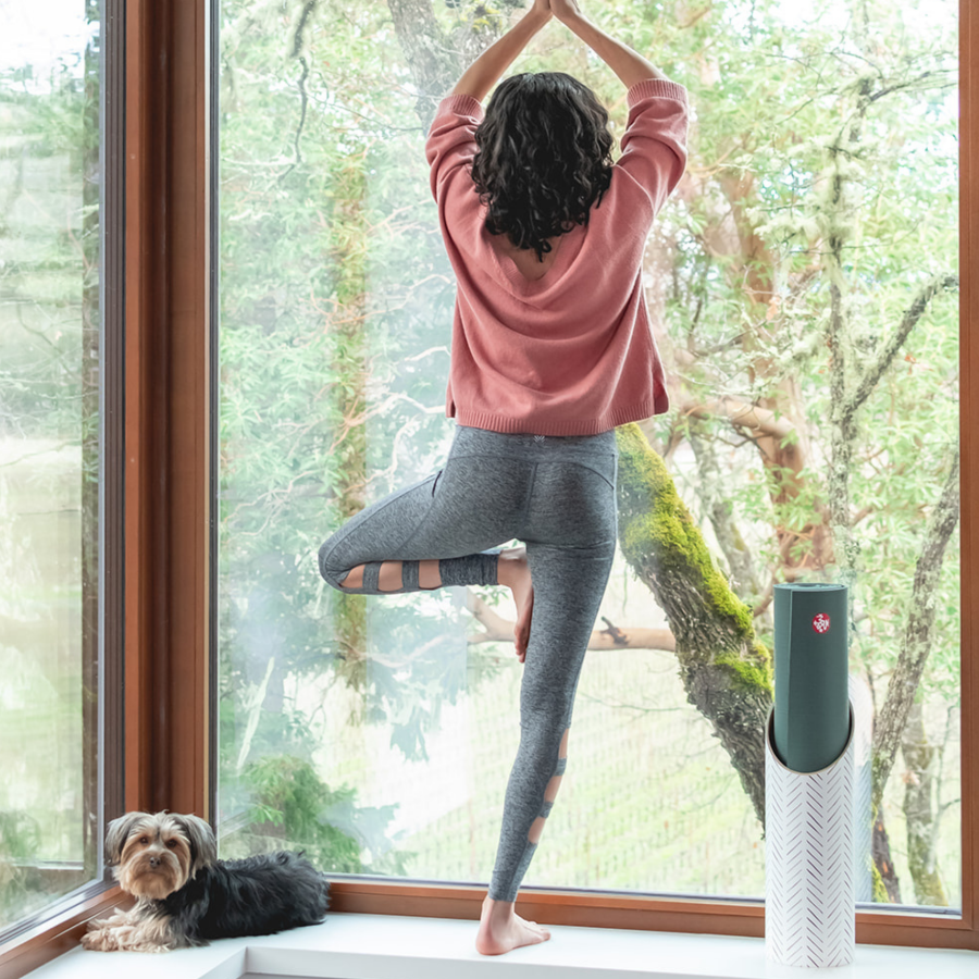 Hatch Yoga Mat Tube Tree Pose in Windowed Yoga Room