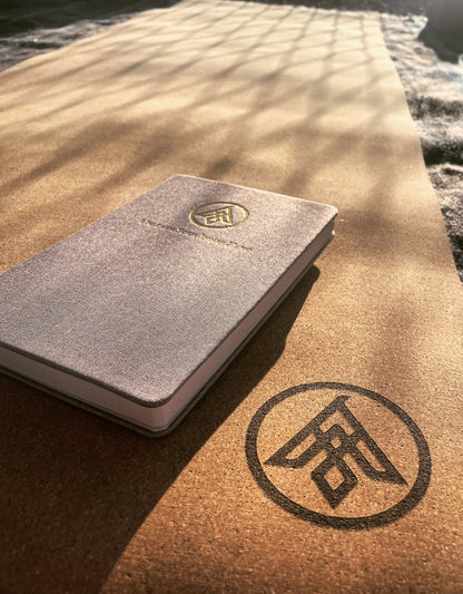 Inner Hero Yoga Journal Asivana Yoga journal on the Flux cork yoga mat in the park