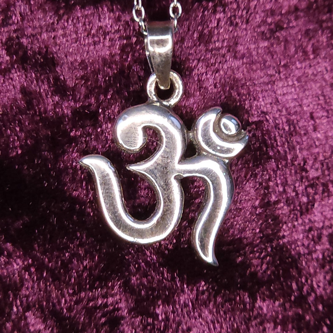 Modern Om Symbol Sterling Silver Pendant Closeup