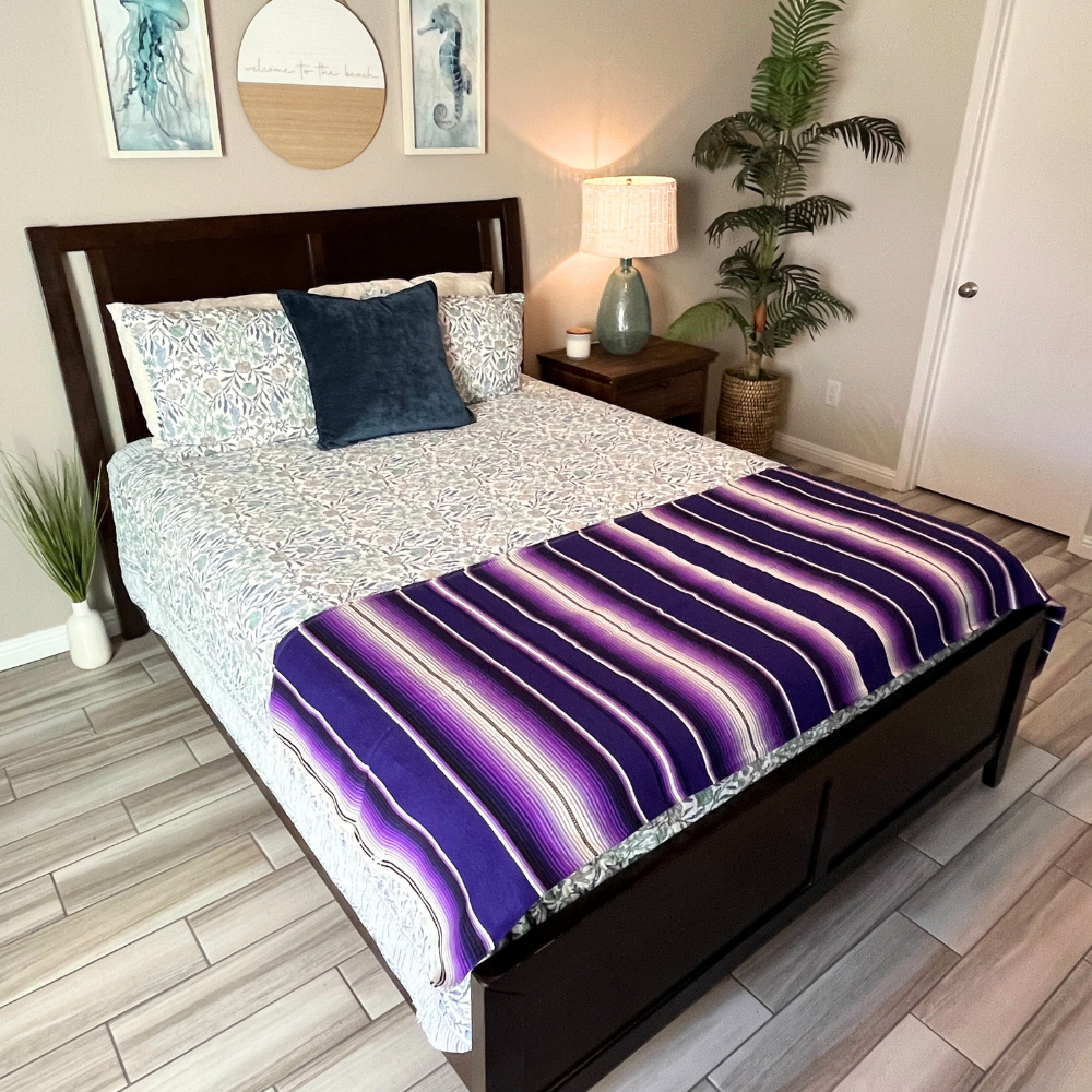Purple Isla Serape Yoga Blanket Styled on Bed