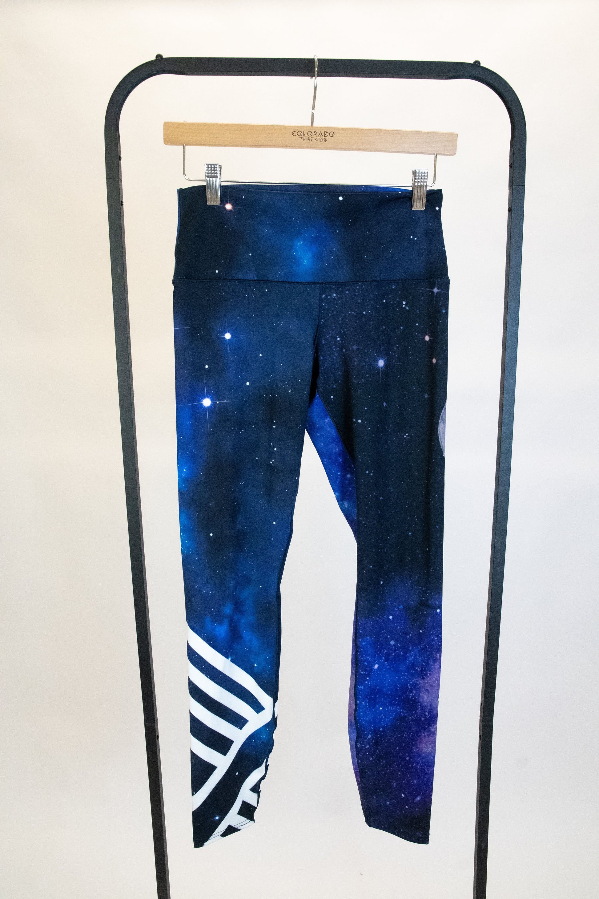 Supernova Yoga Pants Hanging