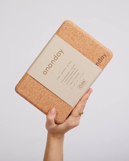 Ananday natural cork yoga block held in hand
