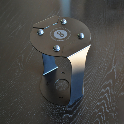 Bottom view of the Black Homi yoga block floor stand