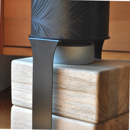 Black Homi yoga block floor stand storing a yoga strap