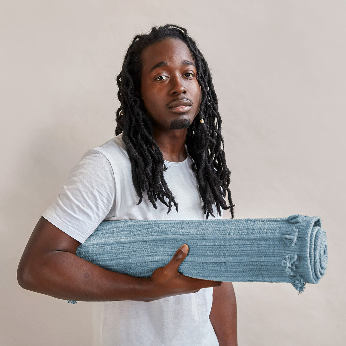 Indigo Moon herbal cotton yoga mat rolled for storage