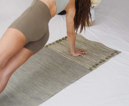 Jade and Jute herbal cotton yoga mat used in side plank