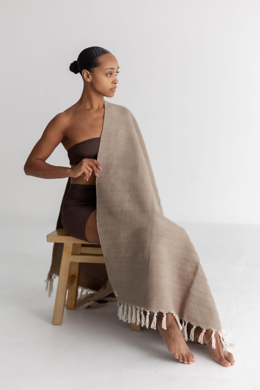 Clay organic cotton yoga blanket used for meditation