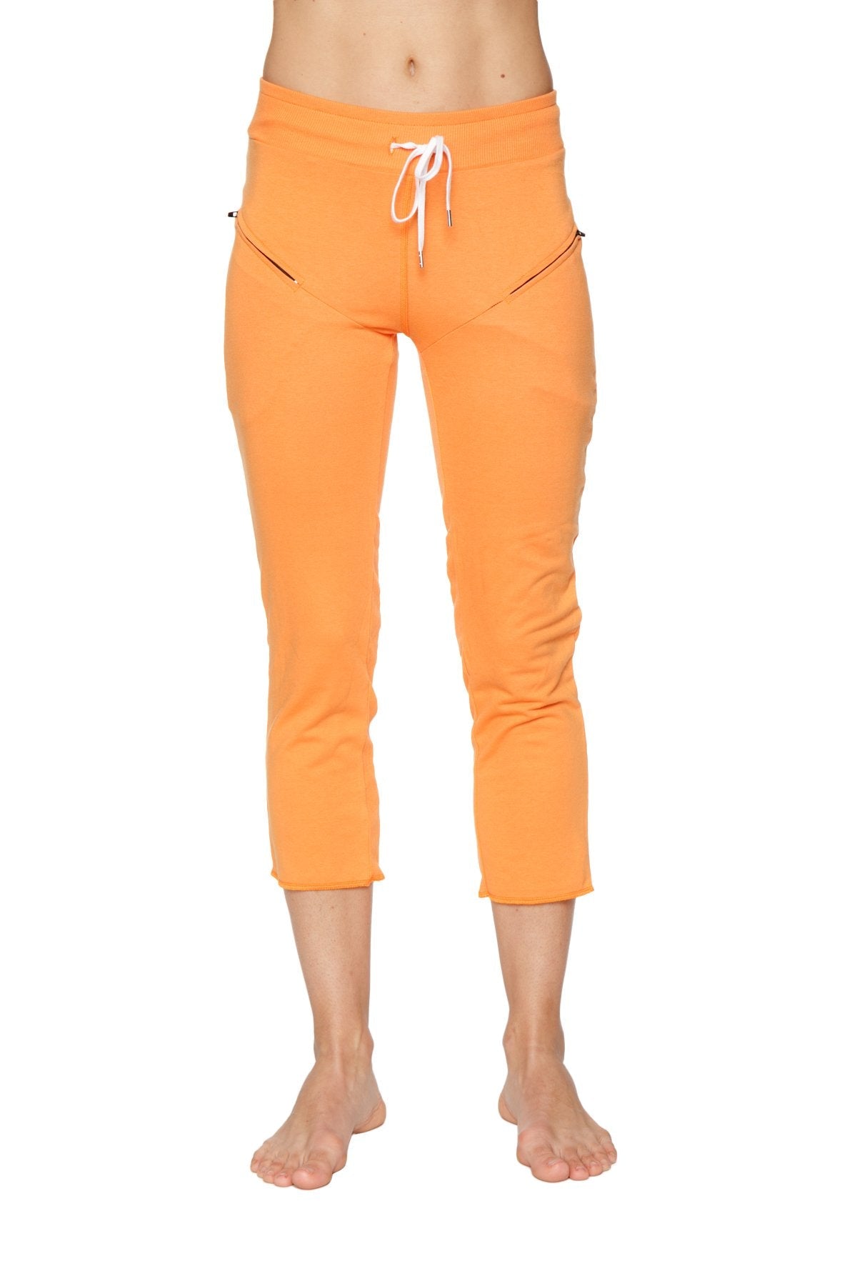 Front view of Women's 4/5 capri yoga pants in Sun Orange